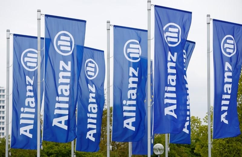 Flags with the logo of Allianz SE Europes biggest insurer