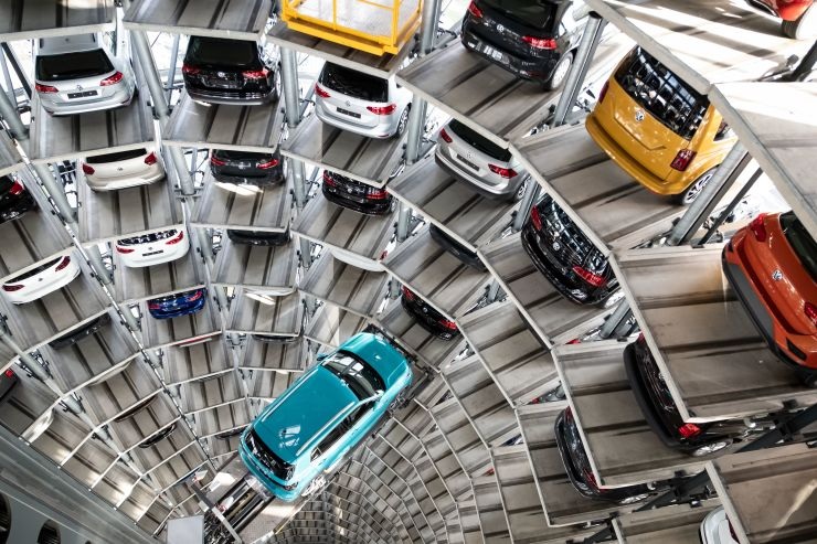 The Volkswagen T Cross model stands on a lifting platform in a car tower on the Volkswagen factory premises