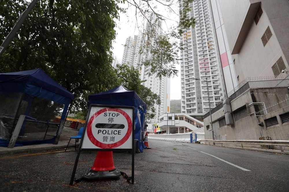 A police road block stands outside Chun Yeung Estate a temporary quarantine center in the Fo Tan area of Hong Kong