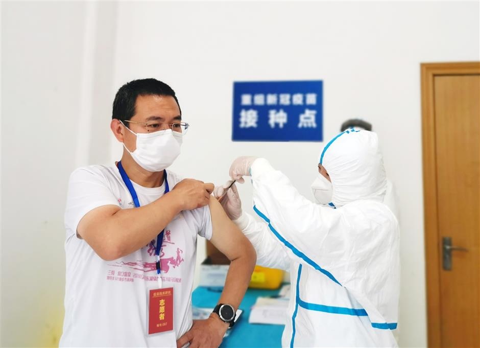 A doctor volunteer receives injection of the adenovirus vector vaccine in Wuhan