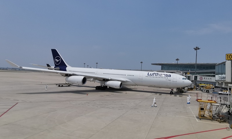 A flight carrying German business travelers from Frankfurt landed in Tianjin at 1145 am on Saturday