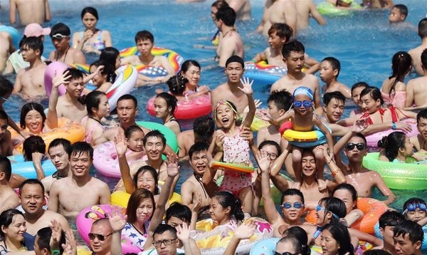 People Have Fun at Water Amusement Park in Chongqing Amid Summer Heat