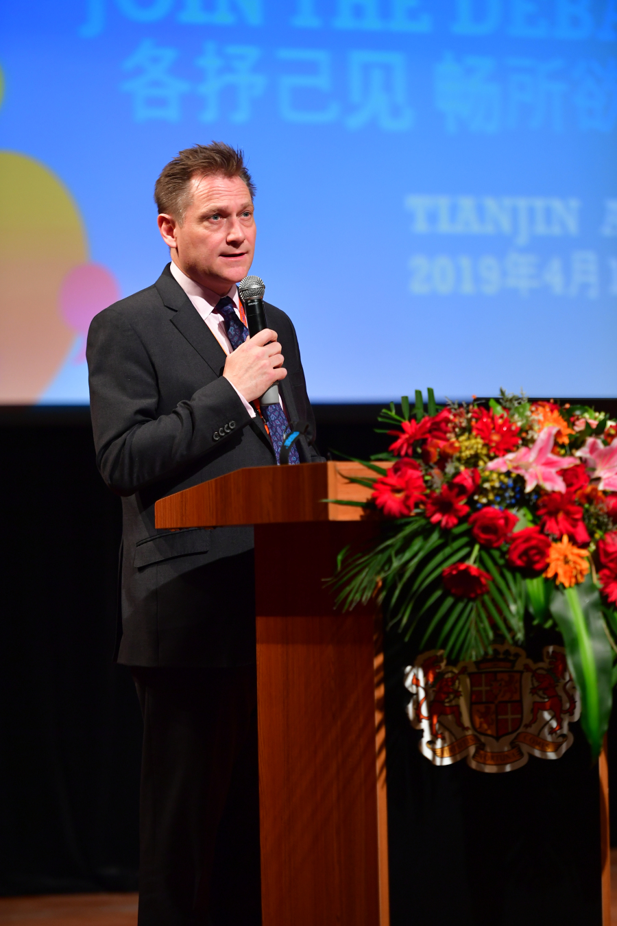 Julian Jeffrey Master of Wellington College Tianjin delivered a welcome speech