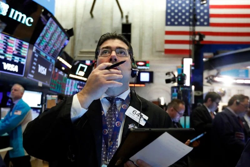 Trader Michael Capolino works on the floor of the New York Stock Exchange Tuesday March 3 2020