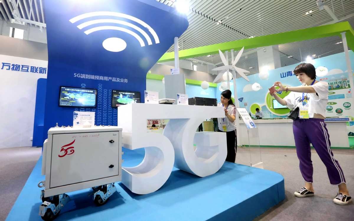 A booth showcasing 5G technology is pictured at an industry expo in Beijing