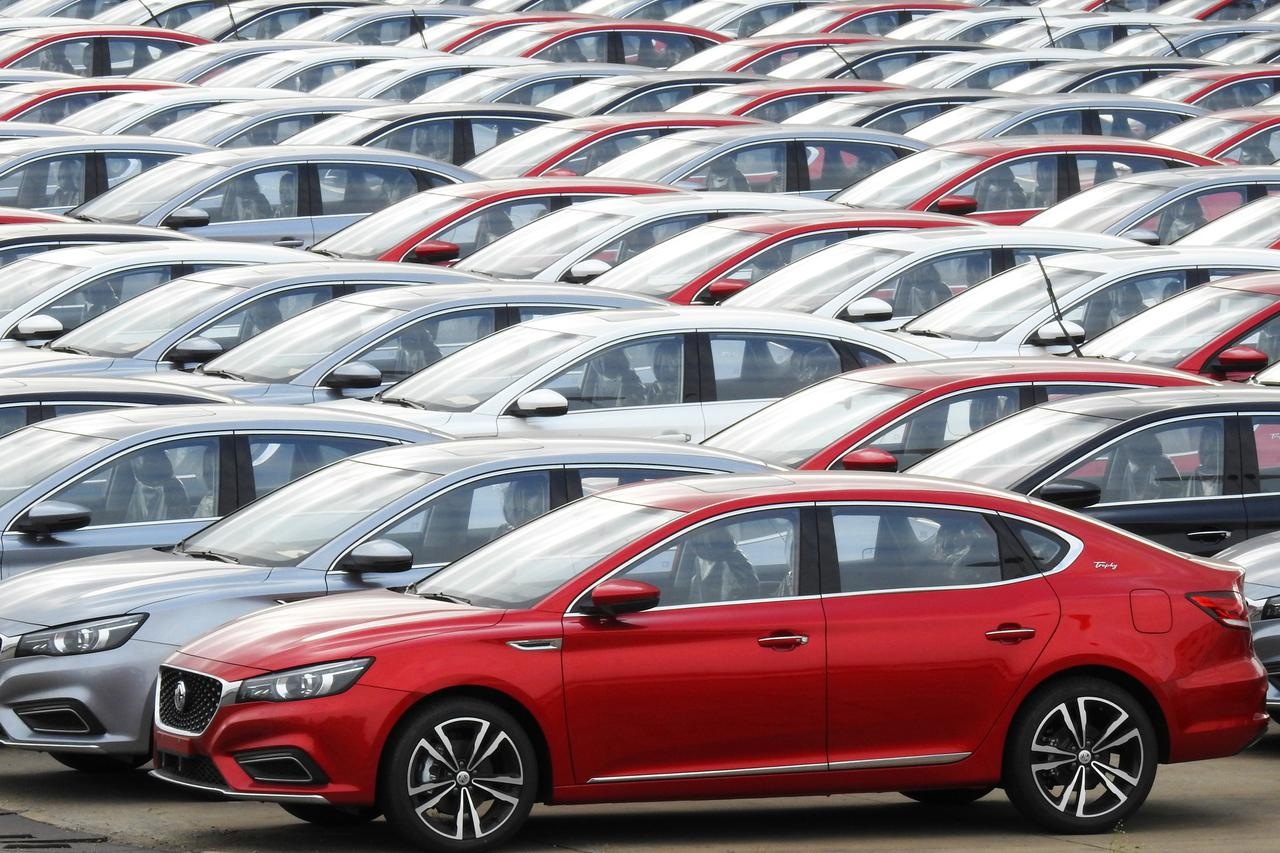 Cars for export wait to be loaded onto cargo vessels at a port in Lianyungang Jiangsu province