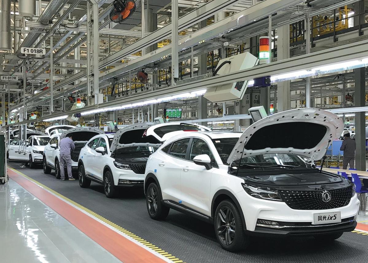 SUVs roll off the assembly line at a Dongfeng plant in Chongqing in April 2019